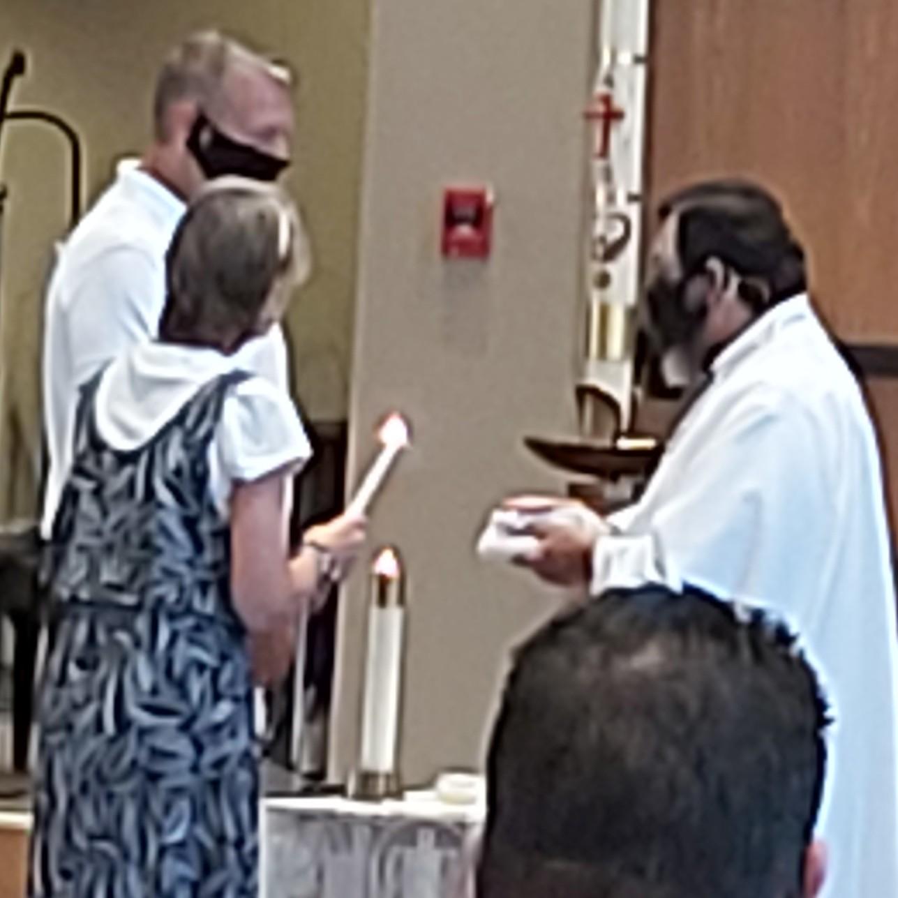 Mike receiving the sacrament of Confirmation