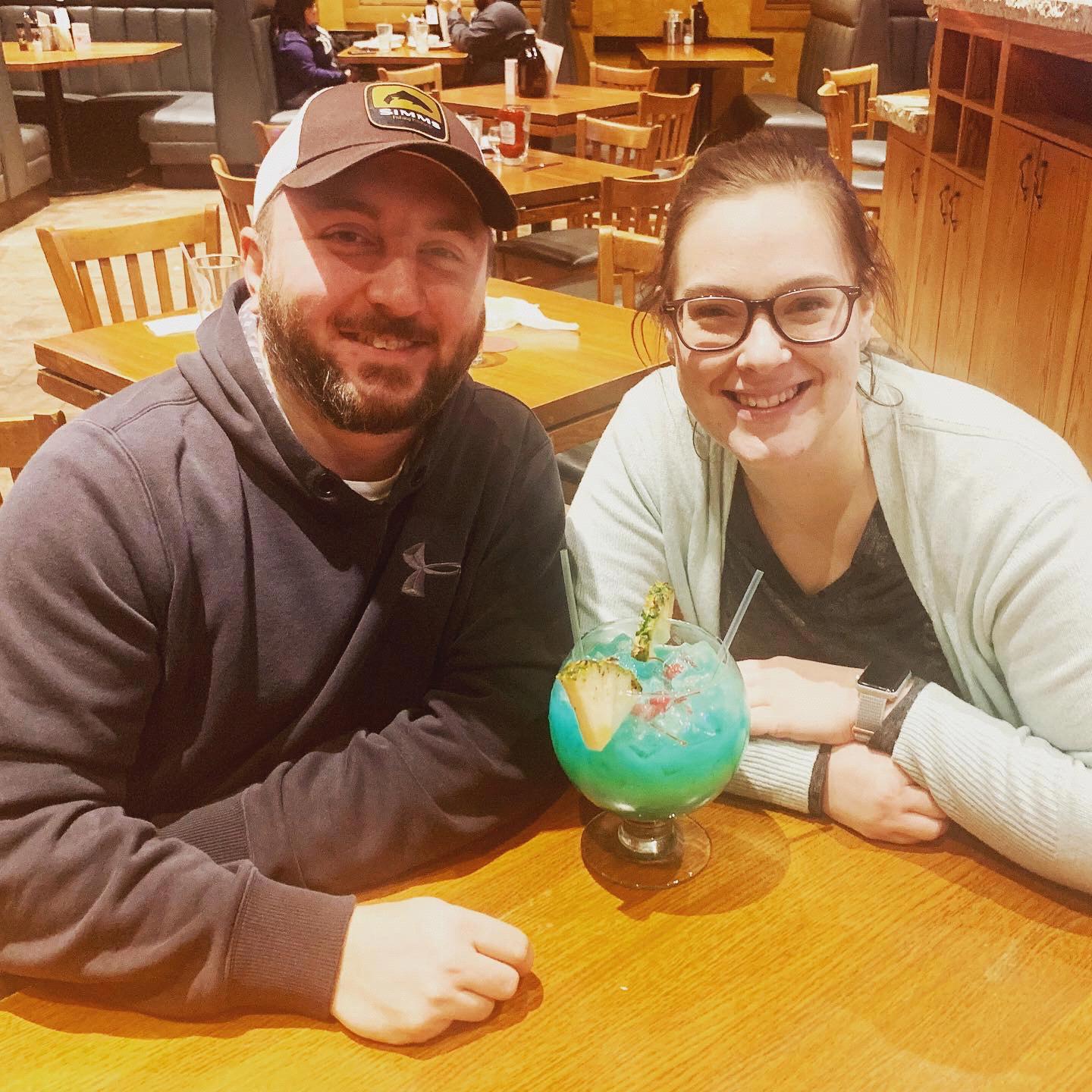 Dinner date sharing a fish bowl drink!
