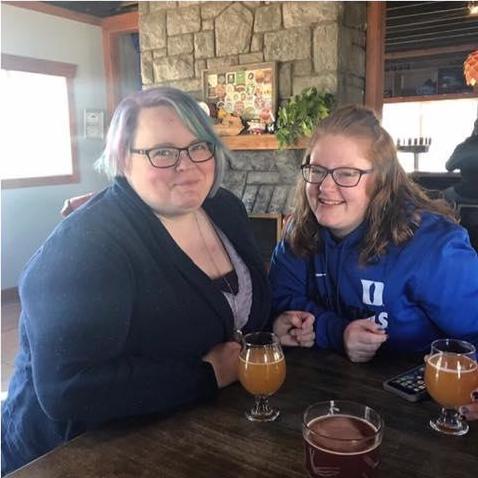 Enjoying beer with friends at Rock House Brewing in Lexington.