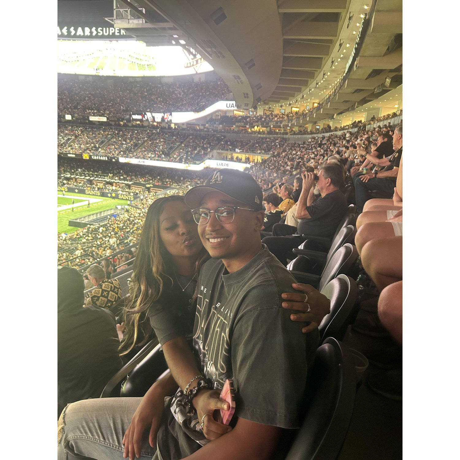 Our first Saints game together, the saints lost but we won because we have each other.