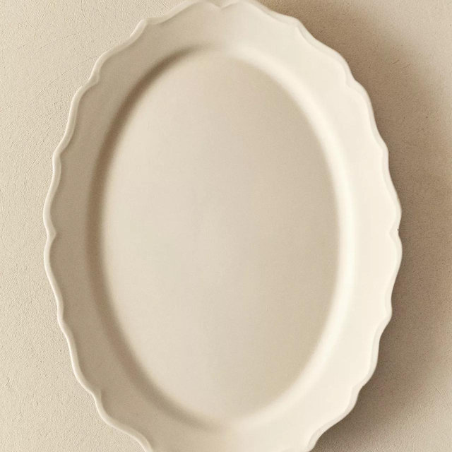 EARTHENWARE SERVING DISH WITH RAISED-DESIGN EDGE