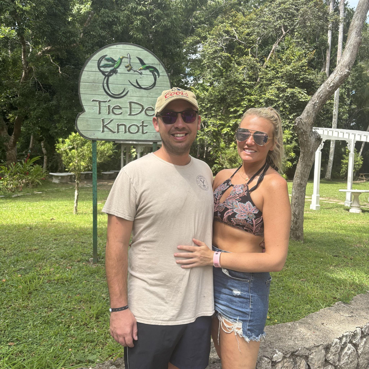 The day after Ricky proposed! We had to get a photo with that sign!