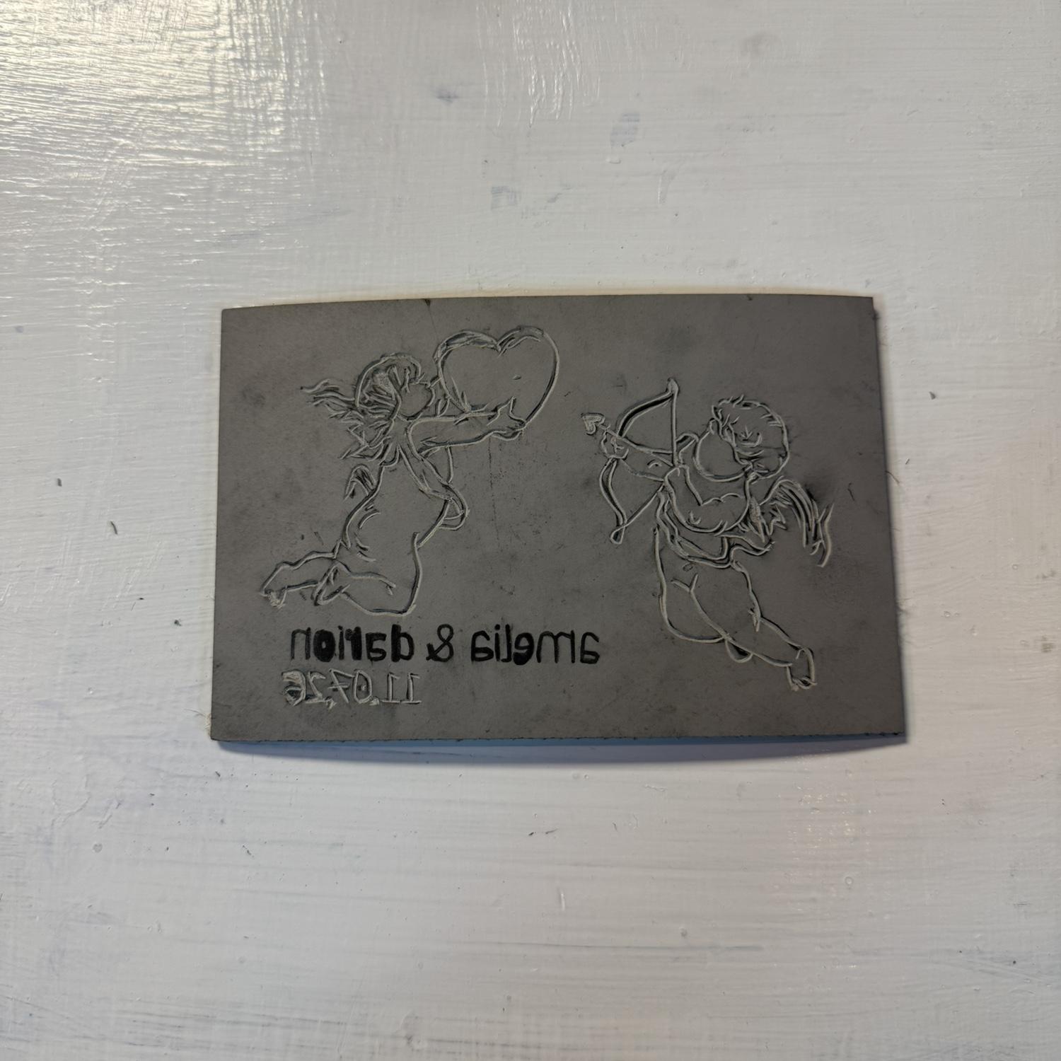 Amelia hand-carved the Save the Date design in a Linocut workshop! Here’s the linoleum before it was pressed into ink!