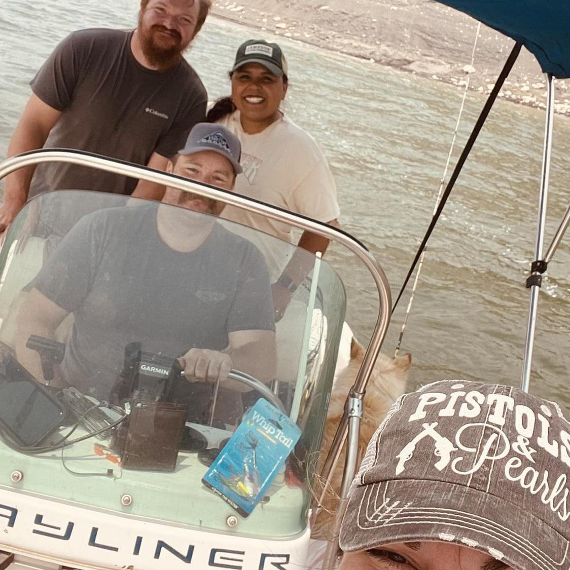 Fishing with our friends Chance and Gloria. The three of them caught 27 fish that day!
