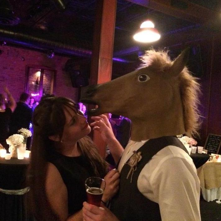 Evan embraces Amber's horse obsession. Graham & Cassie's wedding, Minneapolis, MN, 2015.