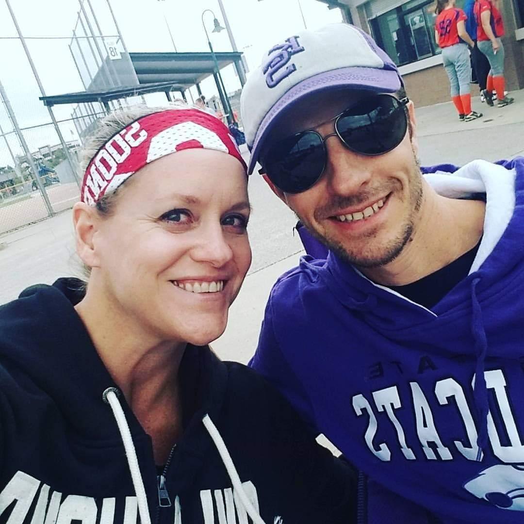 Watching Mazzi's softball game while sneaking a peek at the score from our teams playing each other in football.