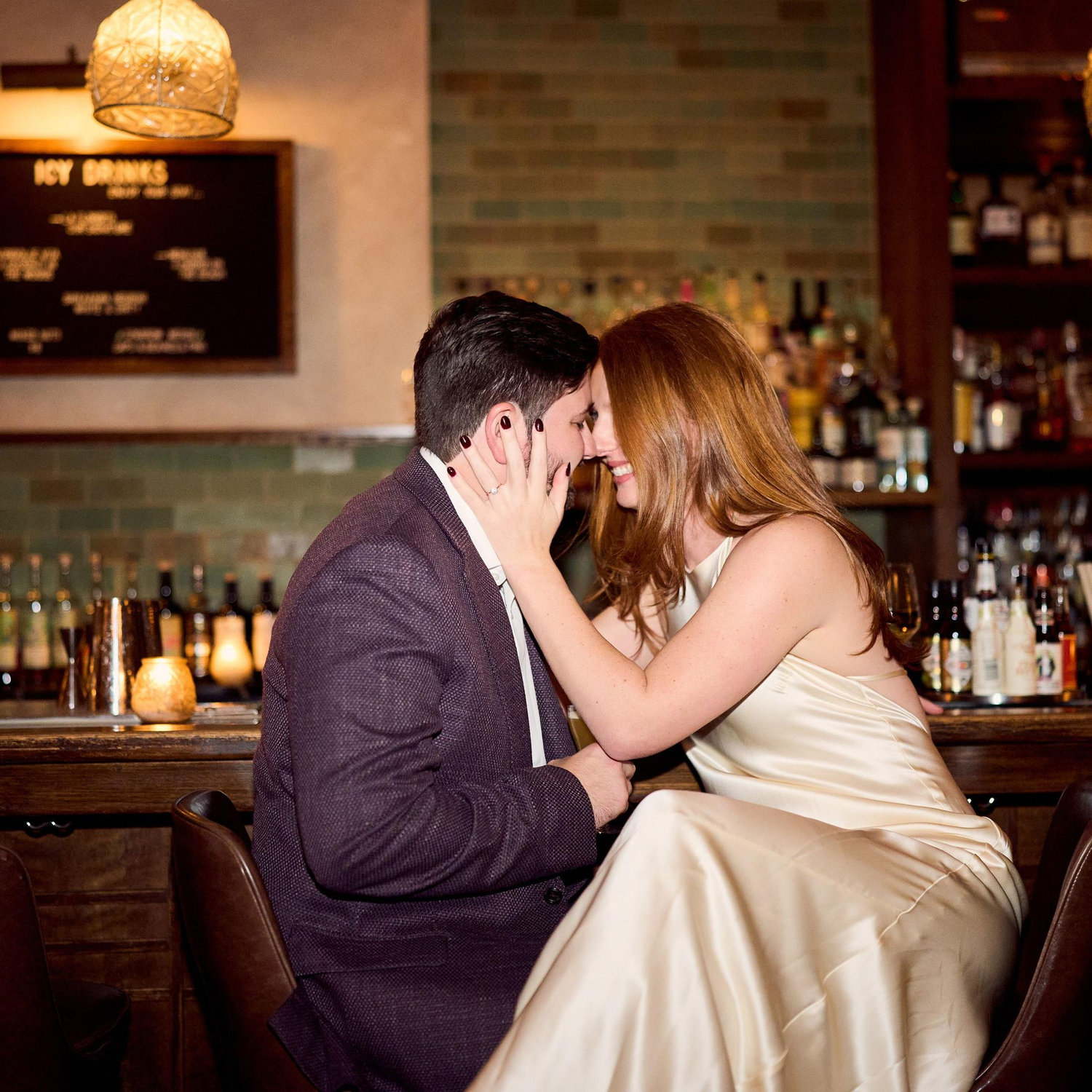 Engagement photos! The bar and seats we had our first date at!