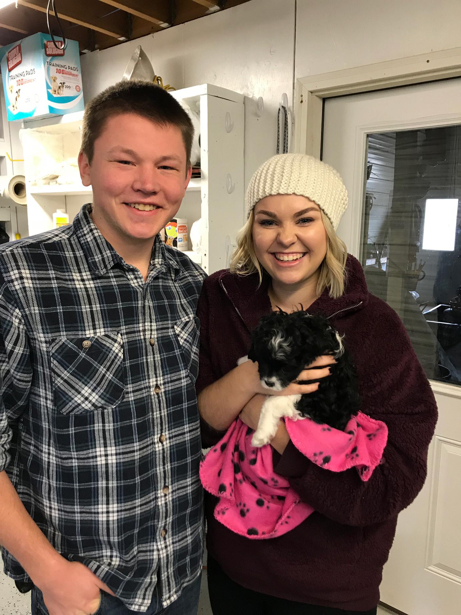 Kelly and Kalyn got their first puppy 2 days after Kalyn graduated from college. Her name is Pepper and she is a Cavapoo!