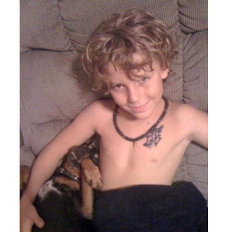 What a cutie! Eli (the groom) when he was little.
