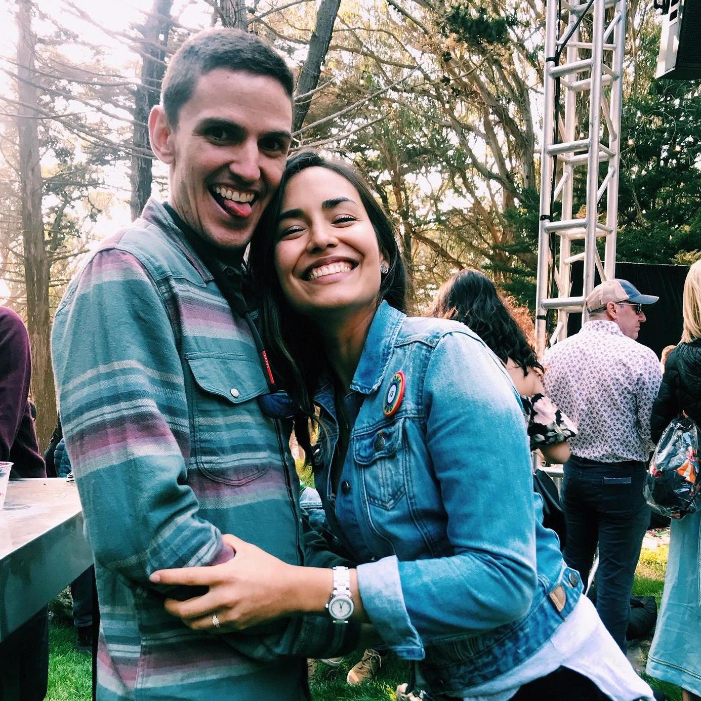 Newly engaged, doin' what we do best, dancing at a music festival