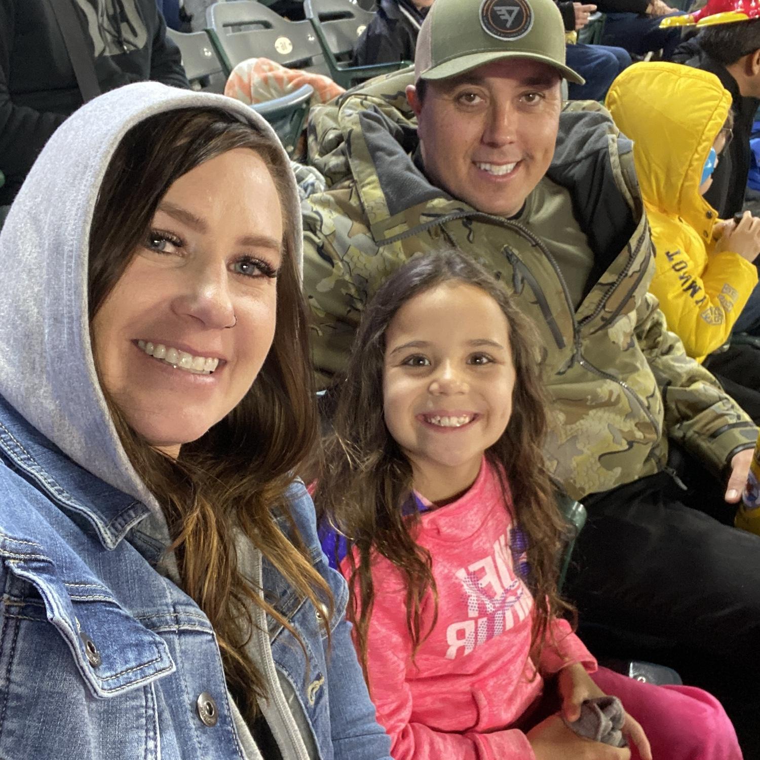 Amanda, Aubrey and Jeff on an outting to see Monster Trucks.