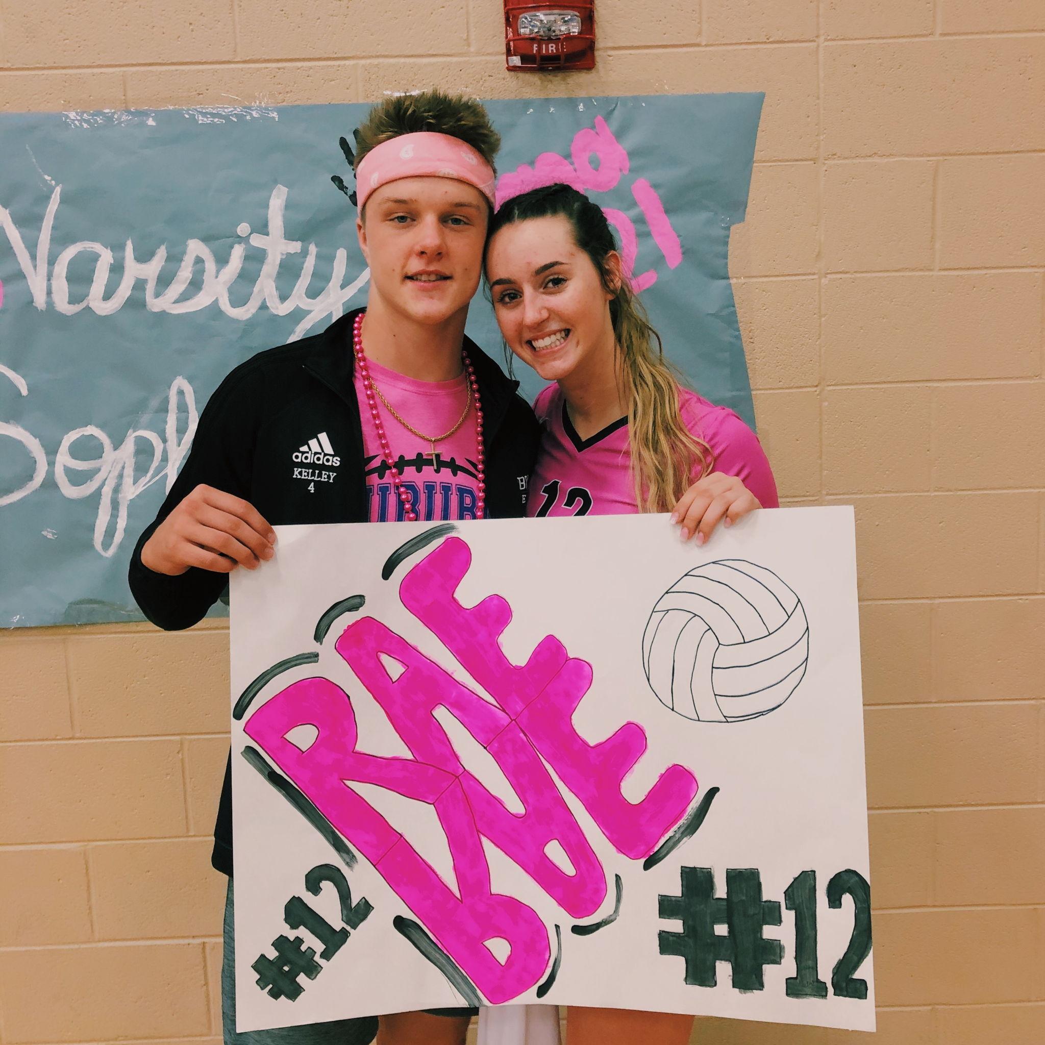 Payson cheering Rachel on at her Dig Pink volleyball game! :)
