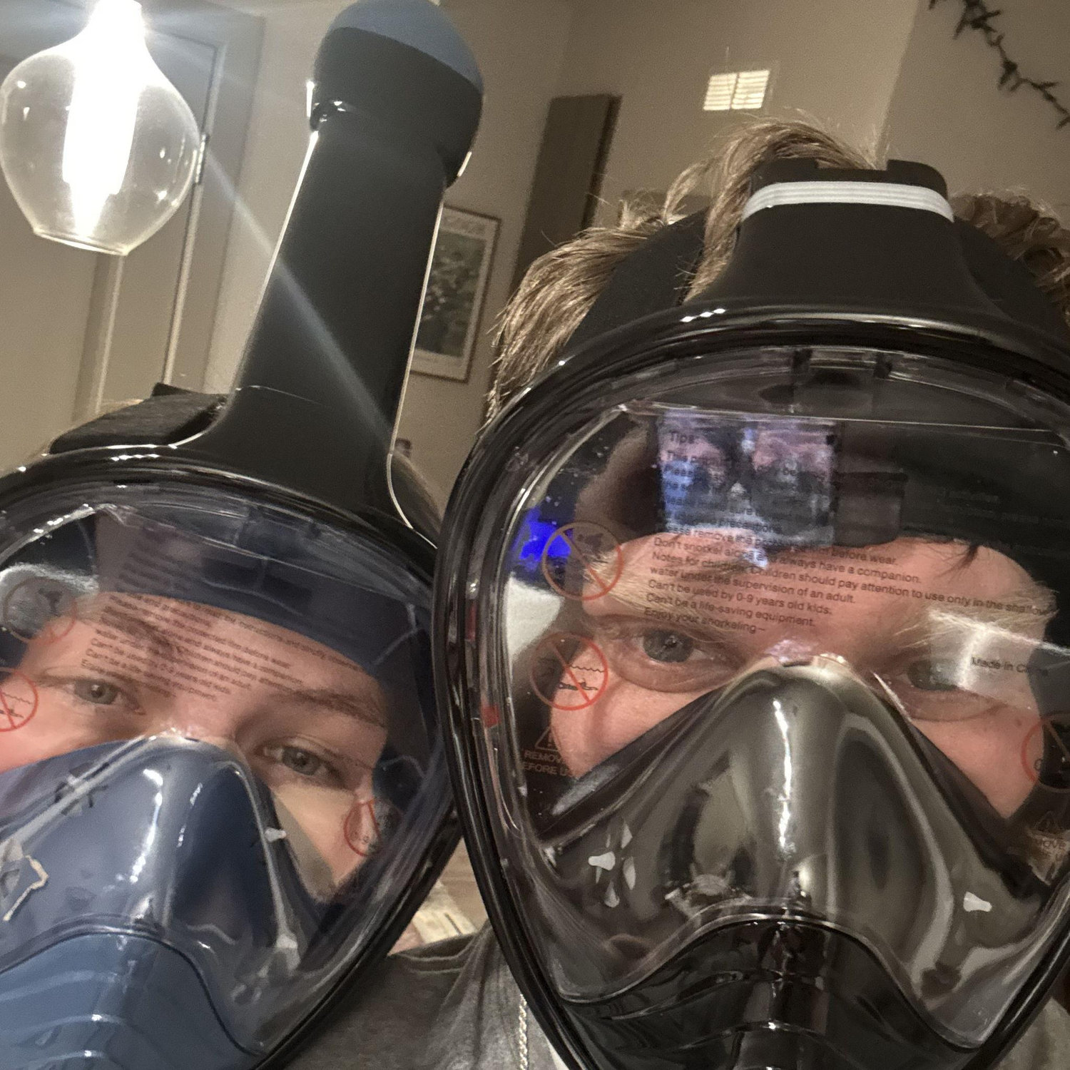 Trying on our snorkeling masks