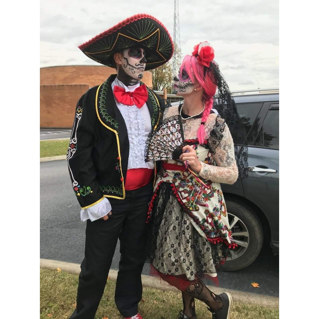 Halloween is my favorite holiday. If I do say so myself, we pull off this "Day of the Dead" look pretty awesomely