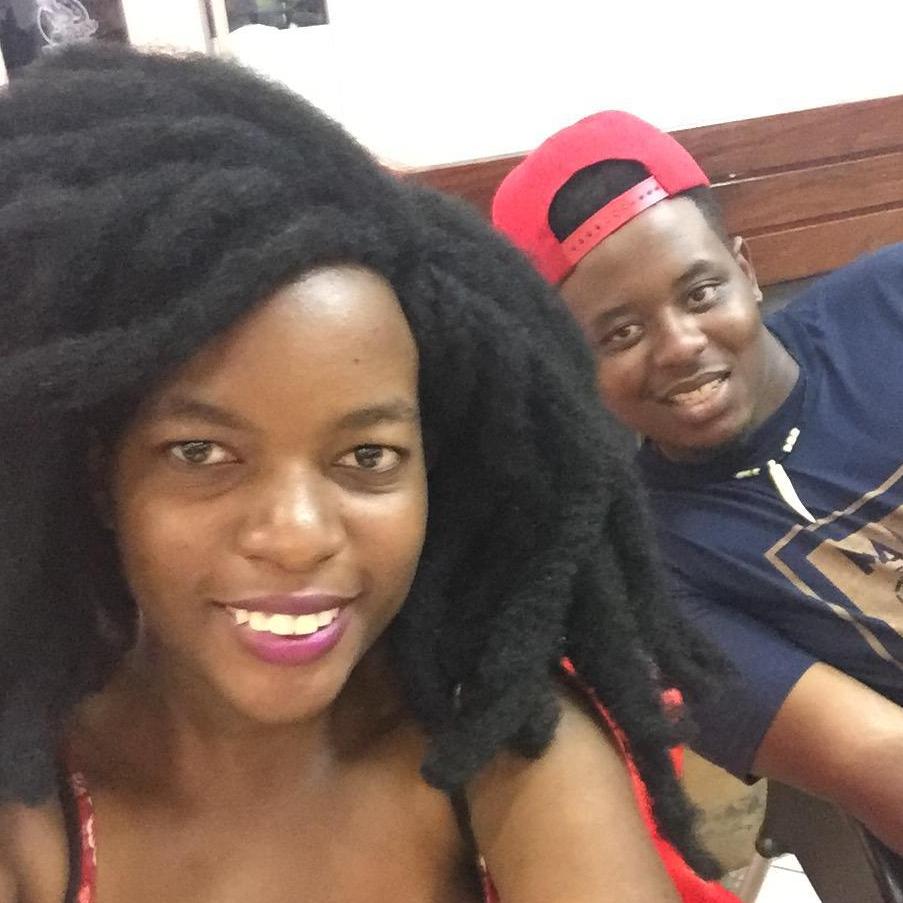 This was at a chicken inn and that fake smile is coz David was hungry but bosslady wanted pictures.