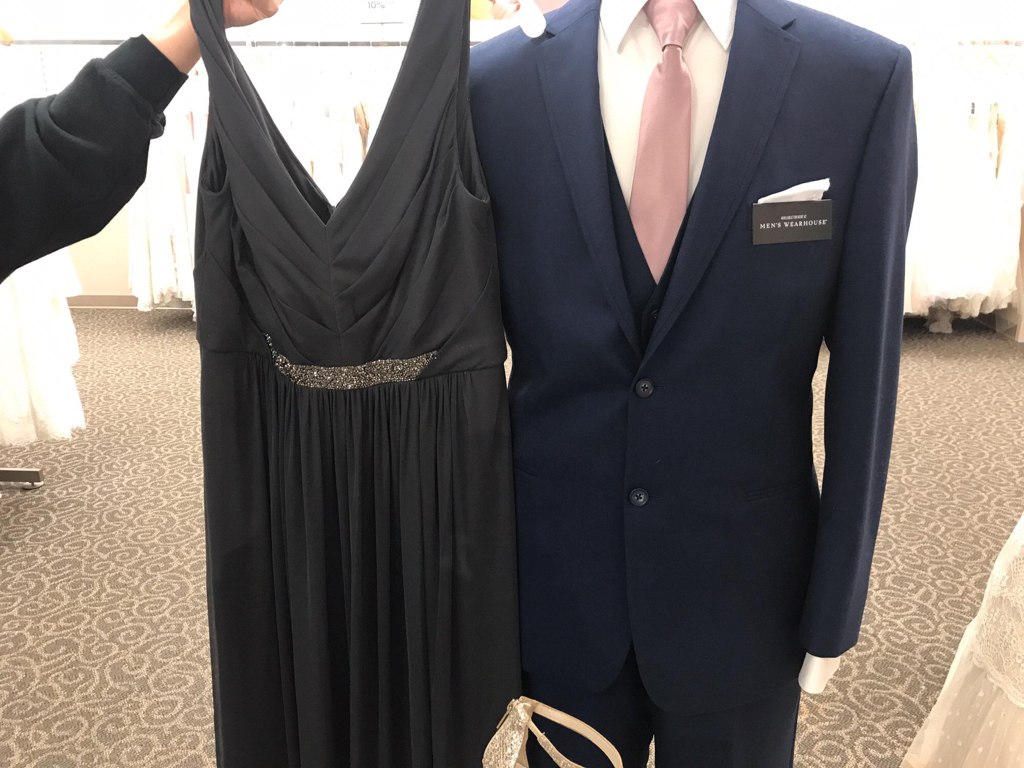 Dark grey gowns for the bridesmaids and a cunning, navy blue suit for the groomsmen (without the pink ties)