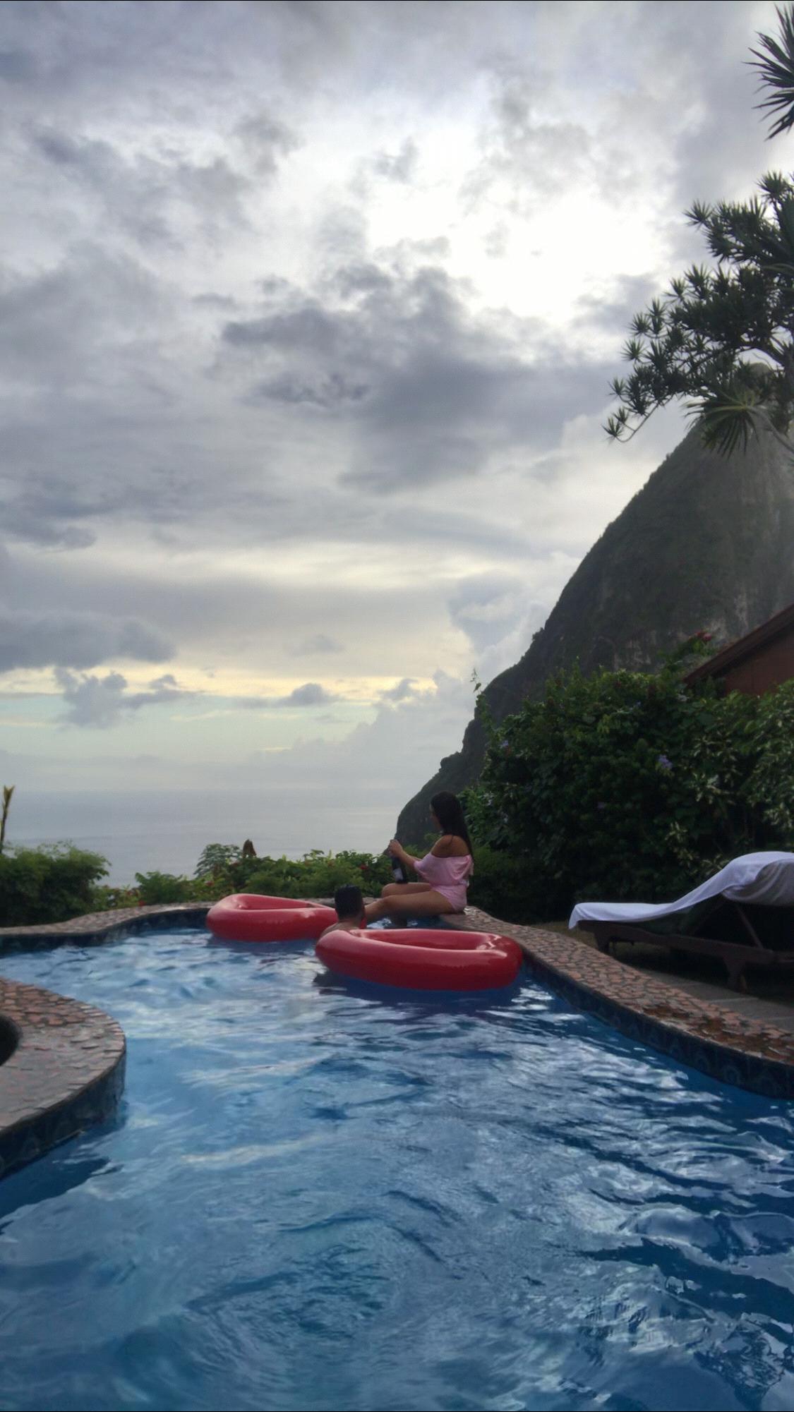 Popping champagne as an engaged couple in St Lucia
