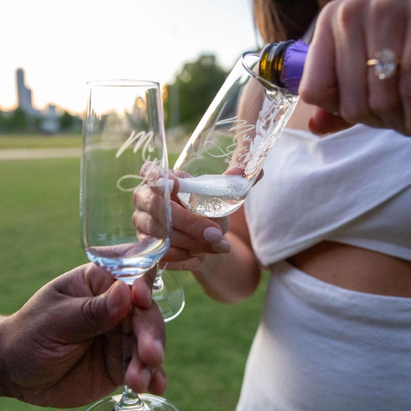 Liquid gold flowing into our beautifully custom-made flutes gifted to us by Erica’s Matron of Honor, Hannah