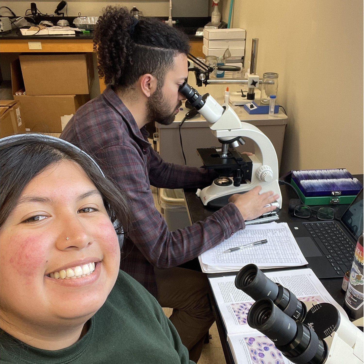 Summer 2023: We spent many hours together working with blood smears from our field collections!