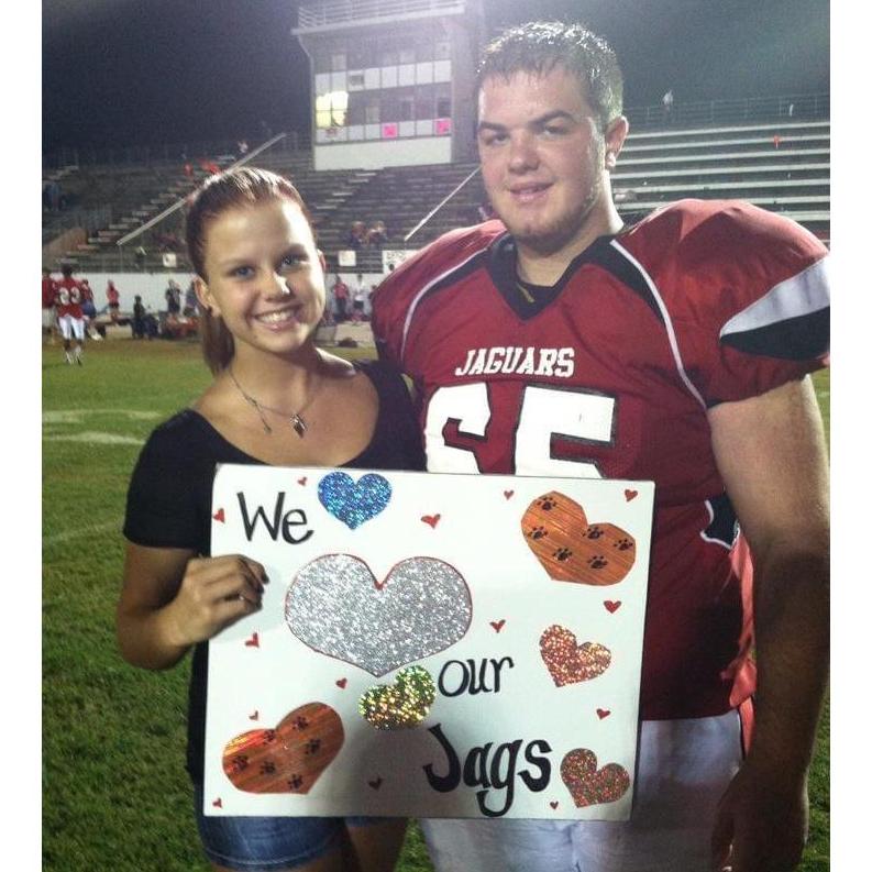 The very begining of our relationship. Cheering him on from the stands under the friday night lights!