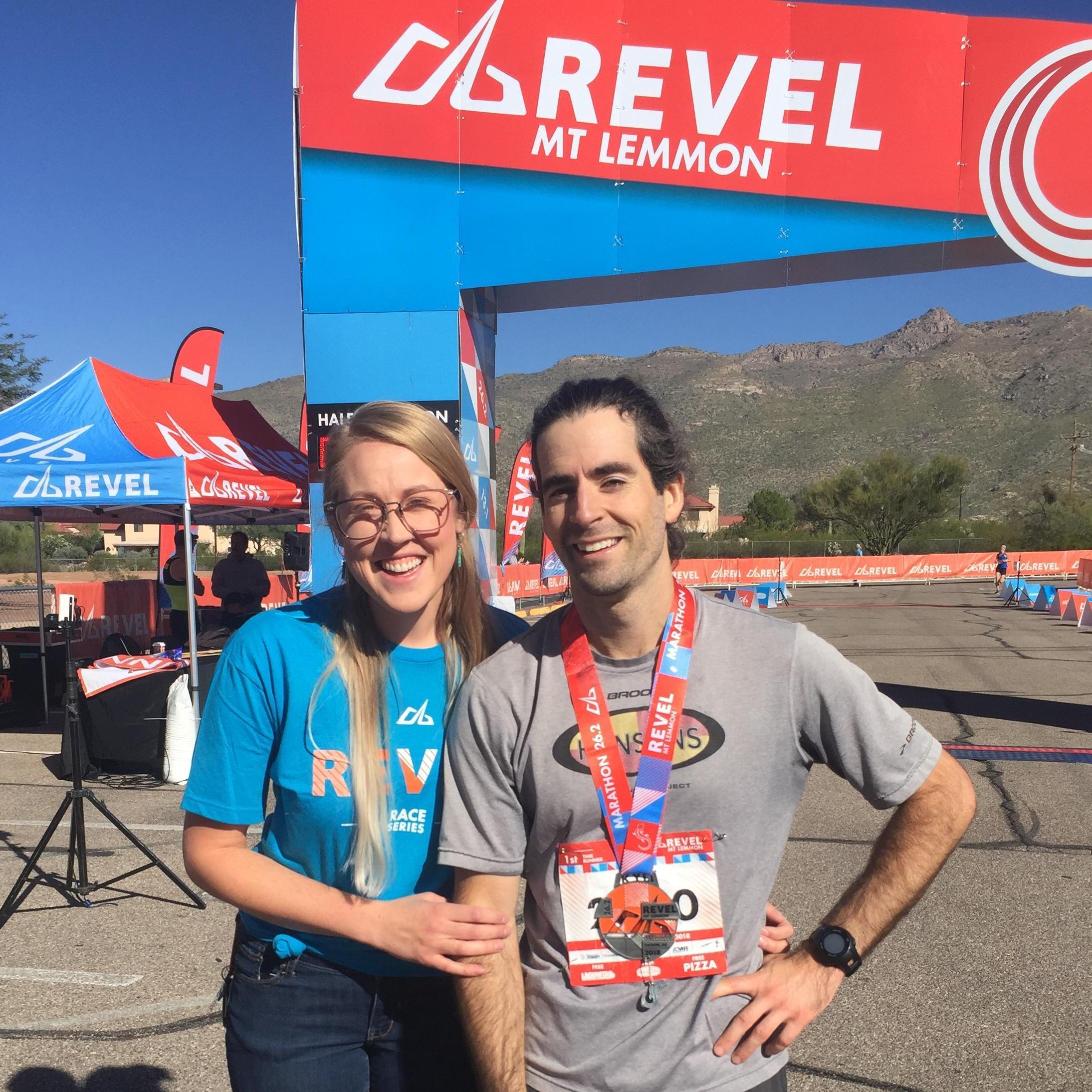 Kyle ran a marathon in Tucson. Kylee volunteered and got to give Kyle his finishing medal.