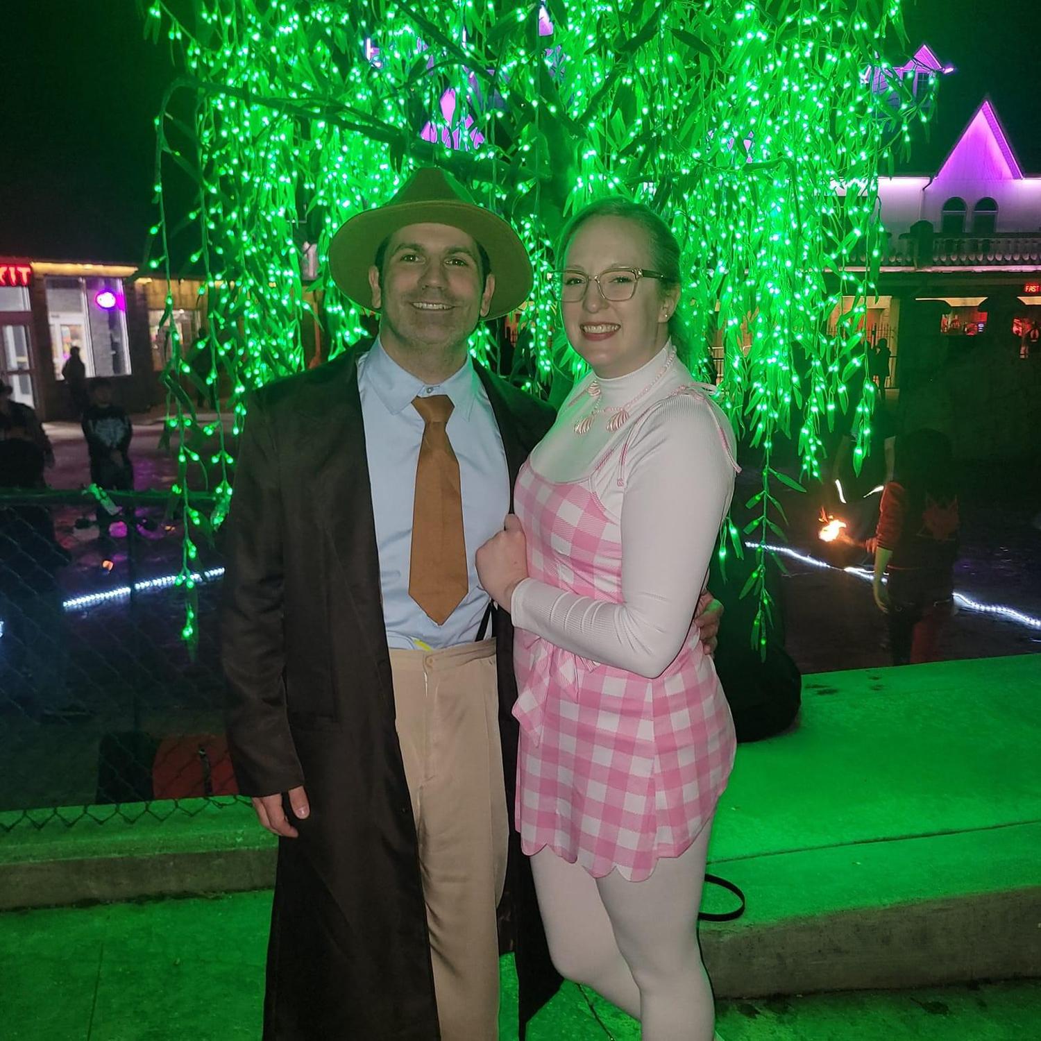 We both share a love of the fall season and Halloween. Our costume in 2023 was 'Barbenheimer!'