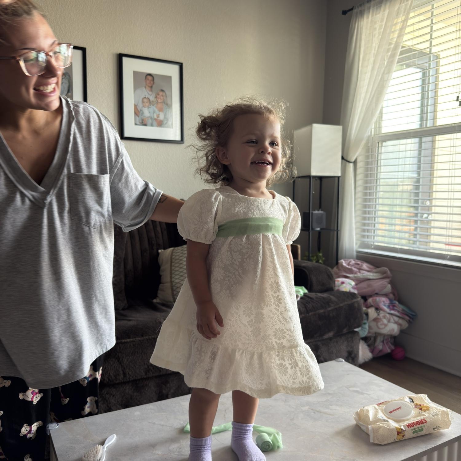 Presley trying on her dress!