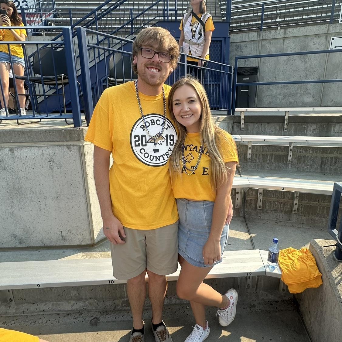Hours after we got engaged, go cats go