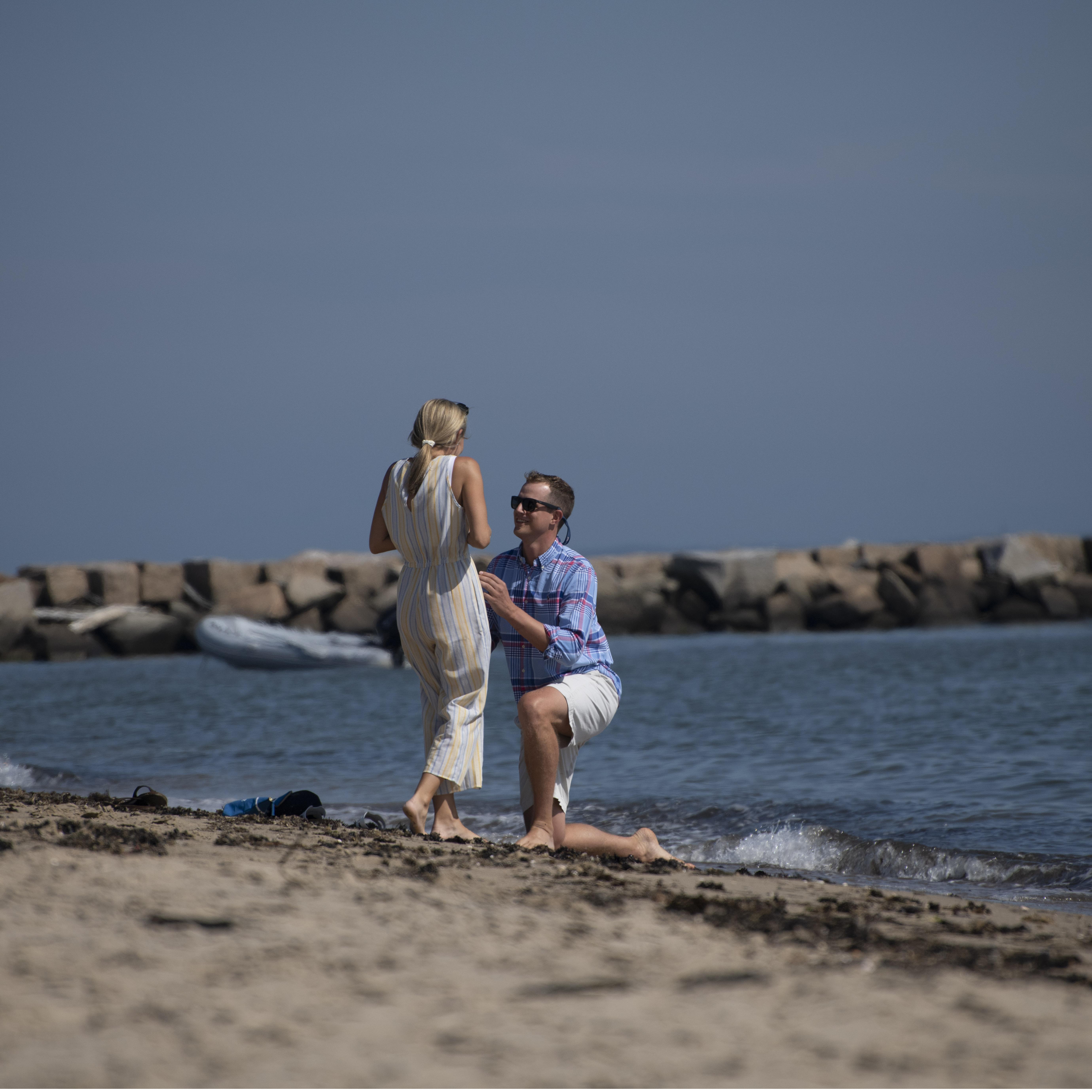 Here's Quinn proposing ... "Emily there are no seals, we are not going to happy hour, and I love you very much!"