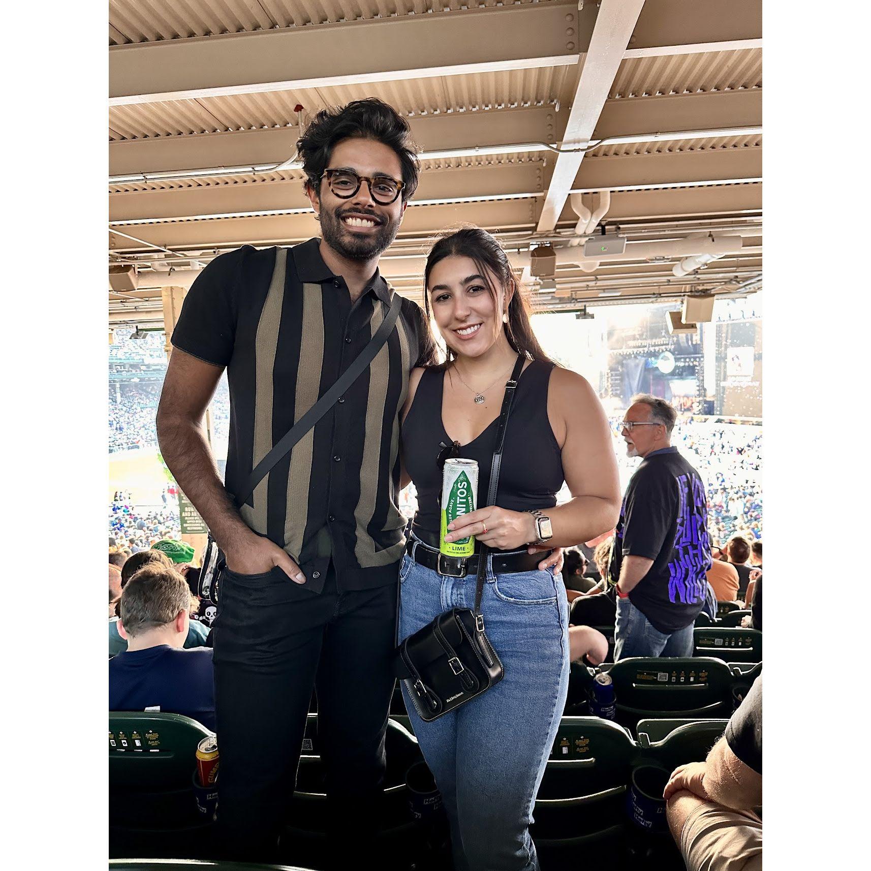 We love going to concerts together - this is us at Fall Out Boy at Wrigley field!