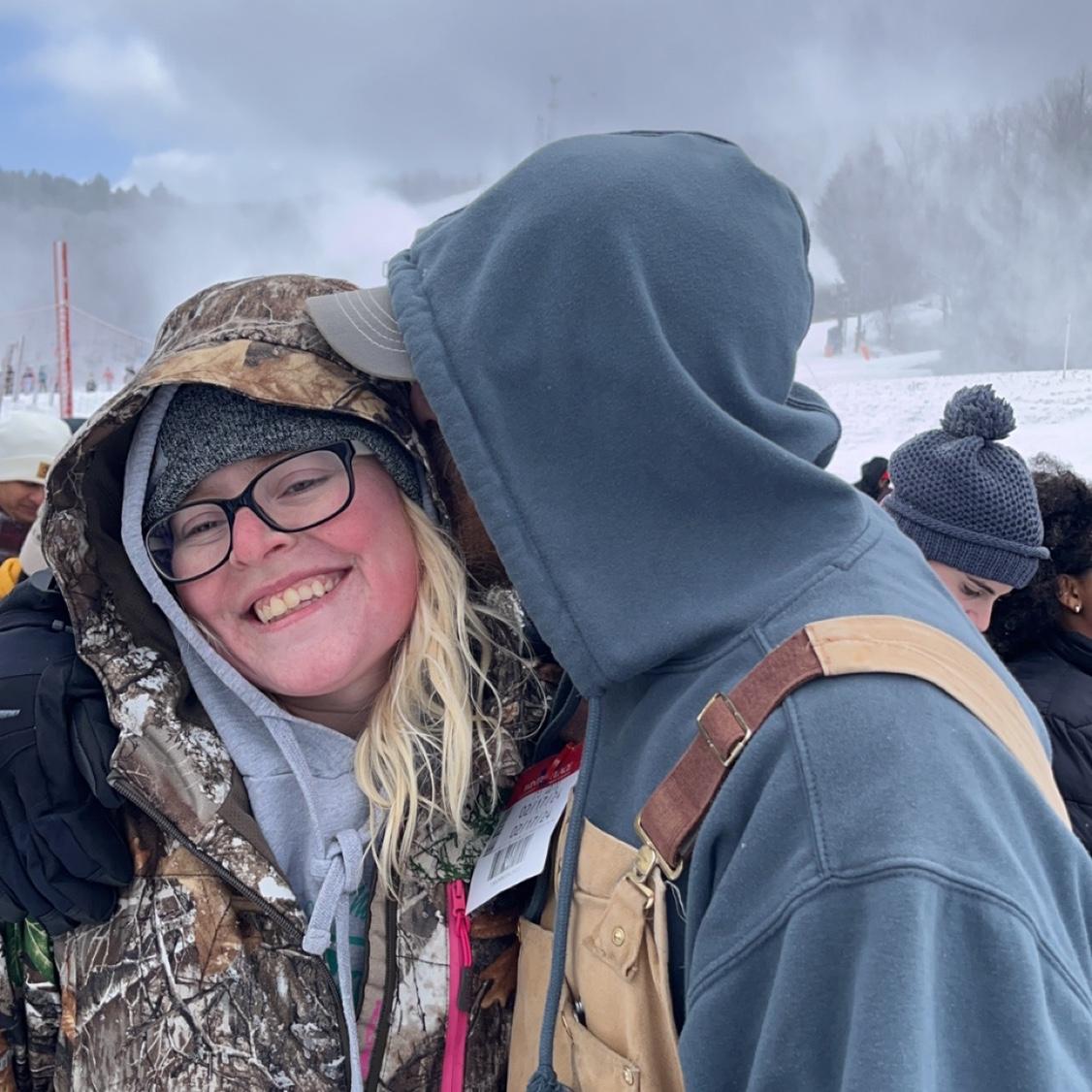 Frozen kisses while waiting to go tubing!