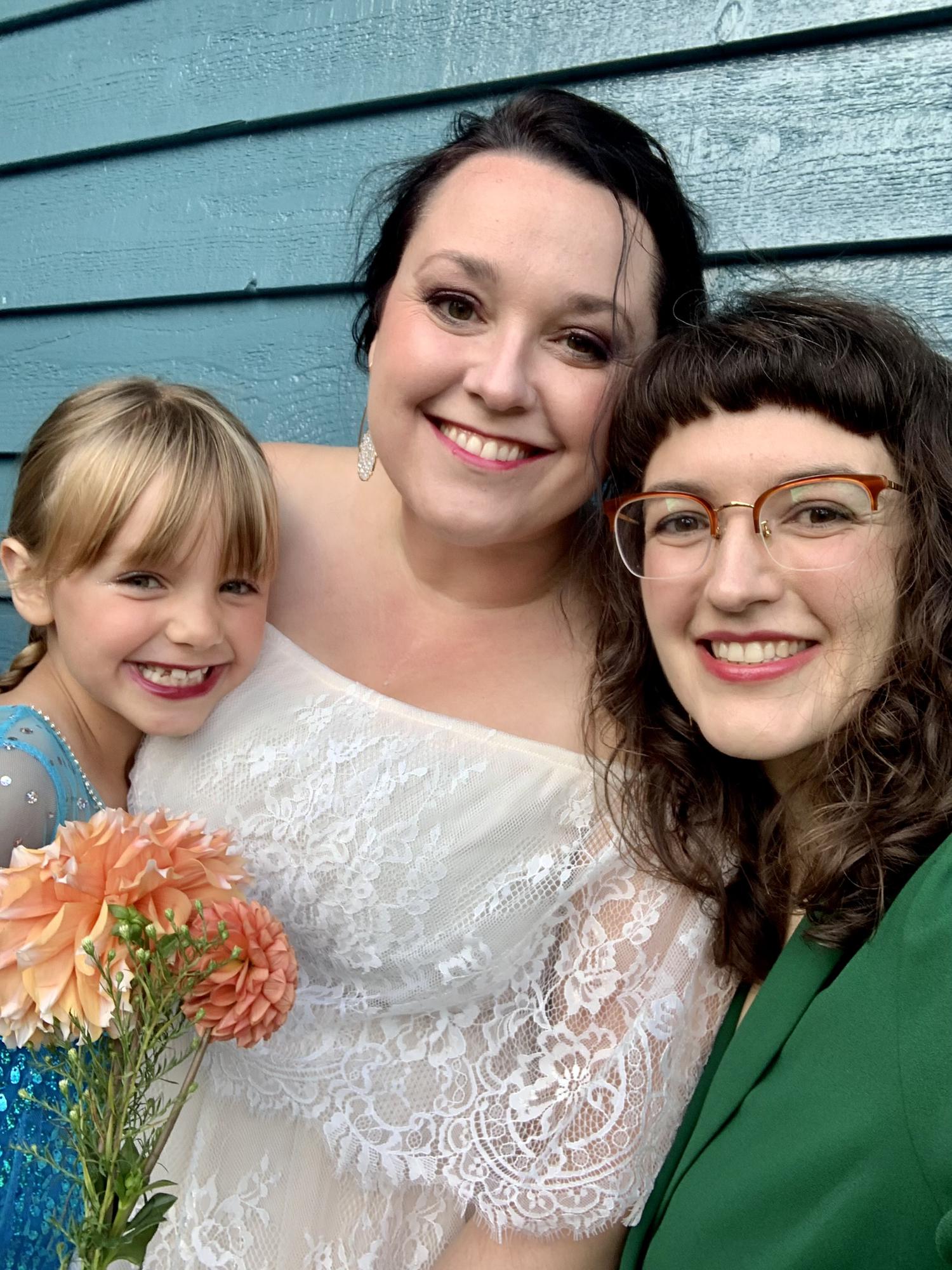 Jess’ sister Adrienne performed the ceremony and helped the girls get ready.