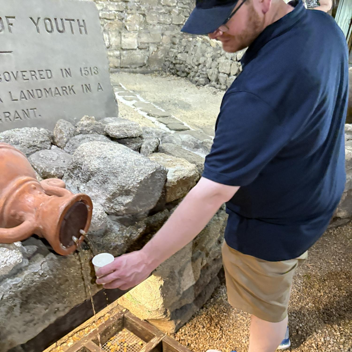 Trying the Fountain of Youth water. Grant says it tastes like Florida tap water. 😂