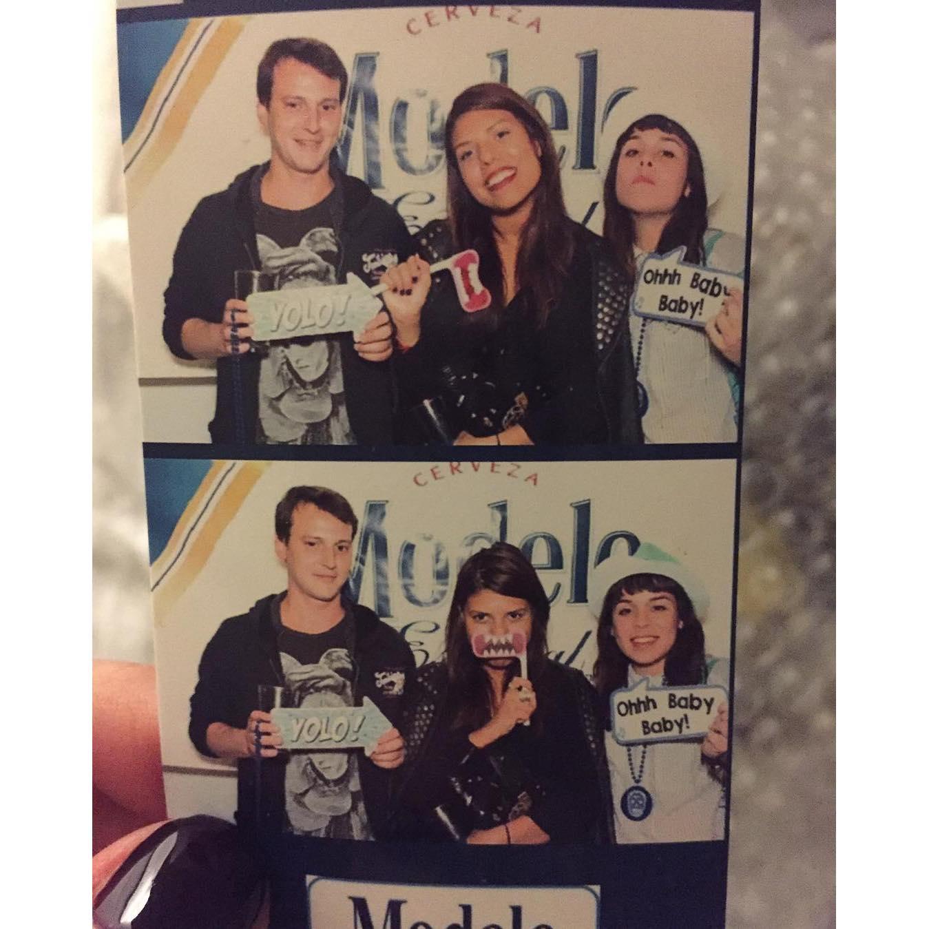 Our first photo together, featuring the reason we met: LAURA! <3