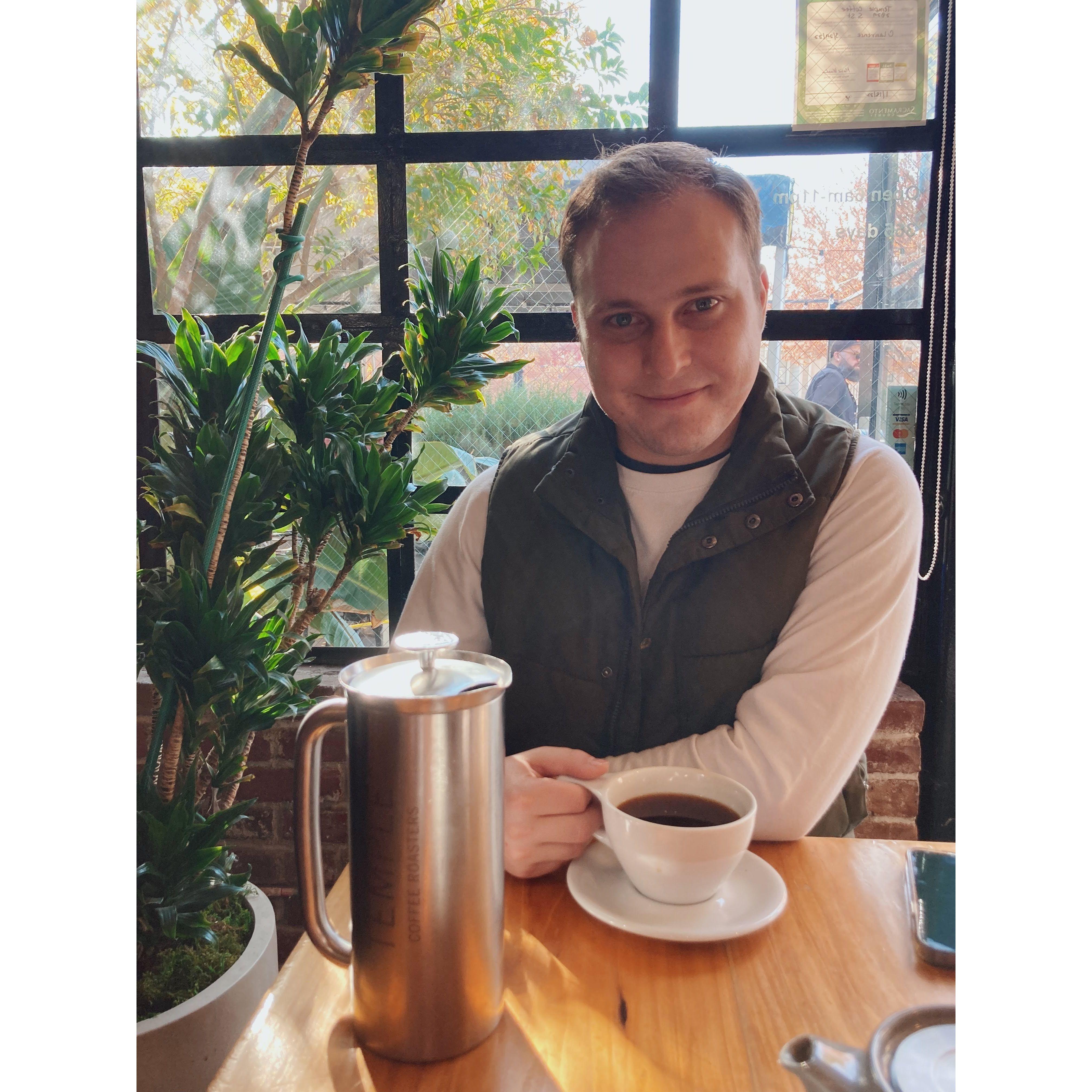 November 2022: Anthony enjoying his boujee Sacramento coffee