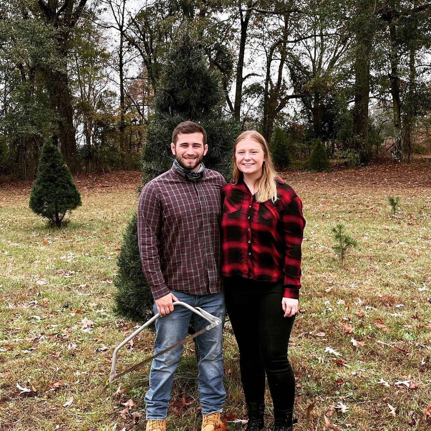 Cutting down our first Christmas Tree together!
