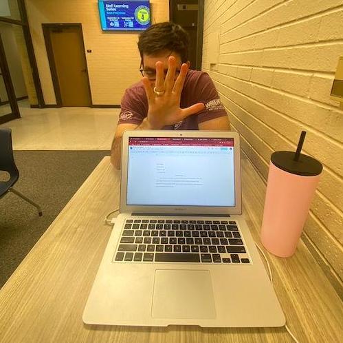 Reilly dropping by to distract Riley from doing homework in between classes
