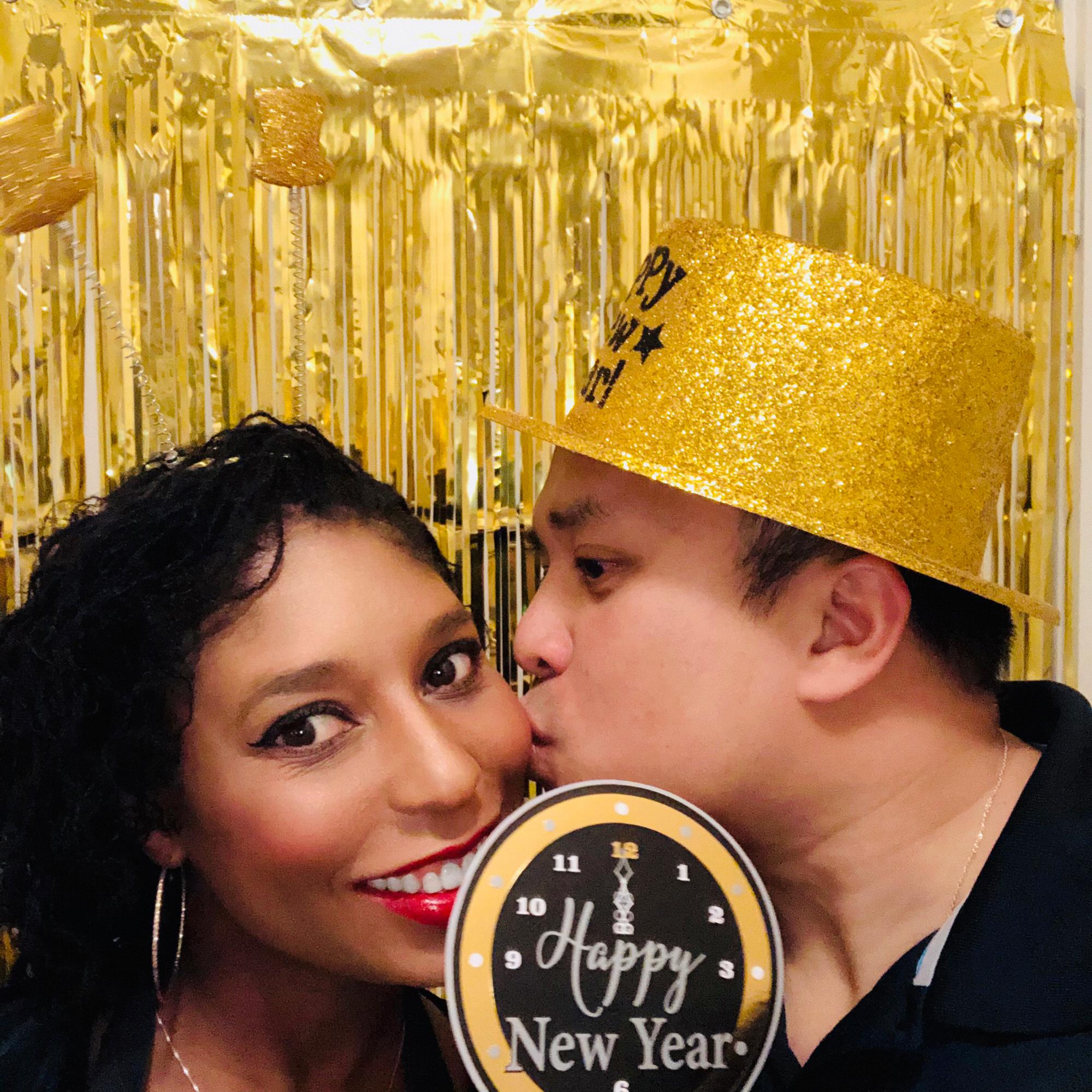 Enjoying the photo wall from our New Years Eve party!