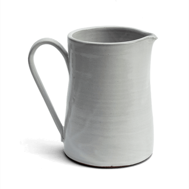 Hand thrown pitcher