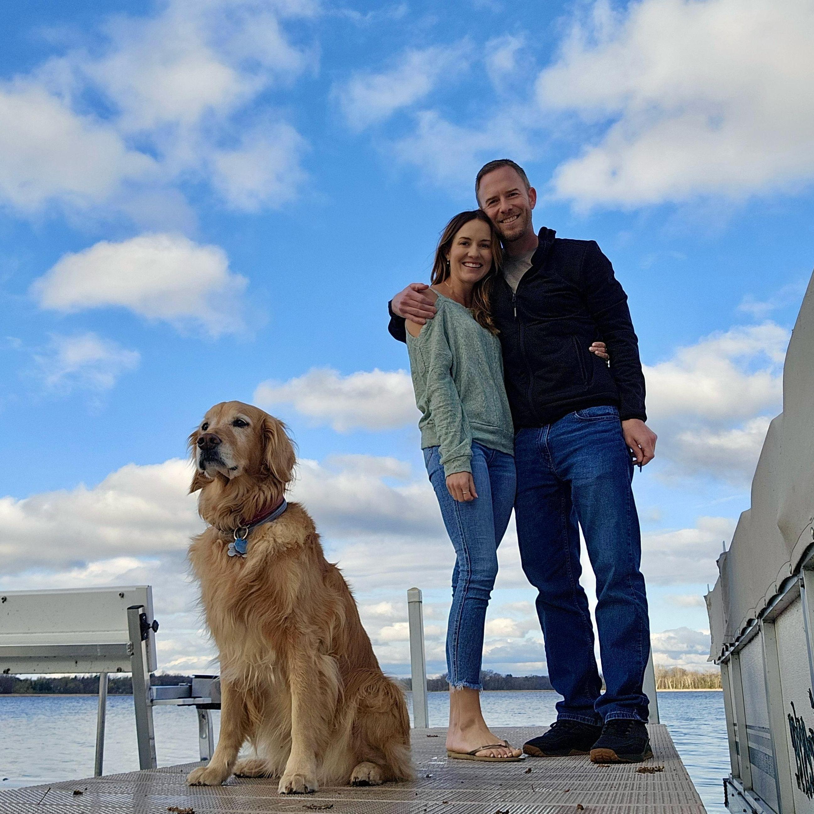 With Addie, Tim and Bon's dog, on the dock on Otter Lake