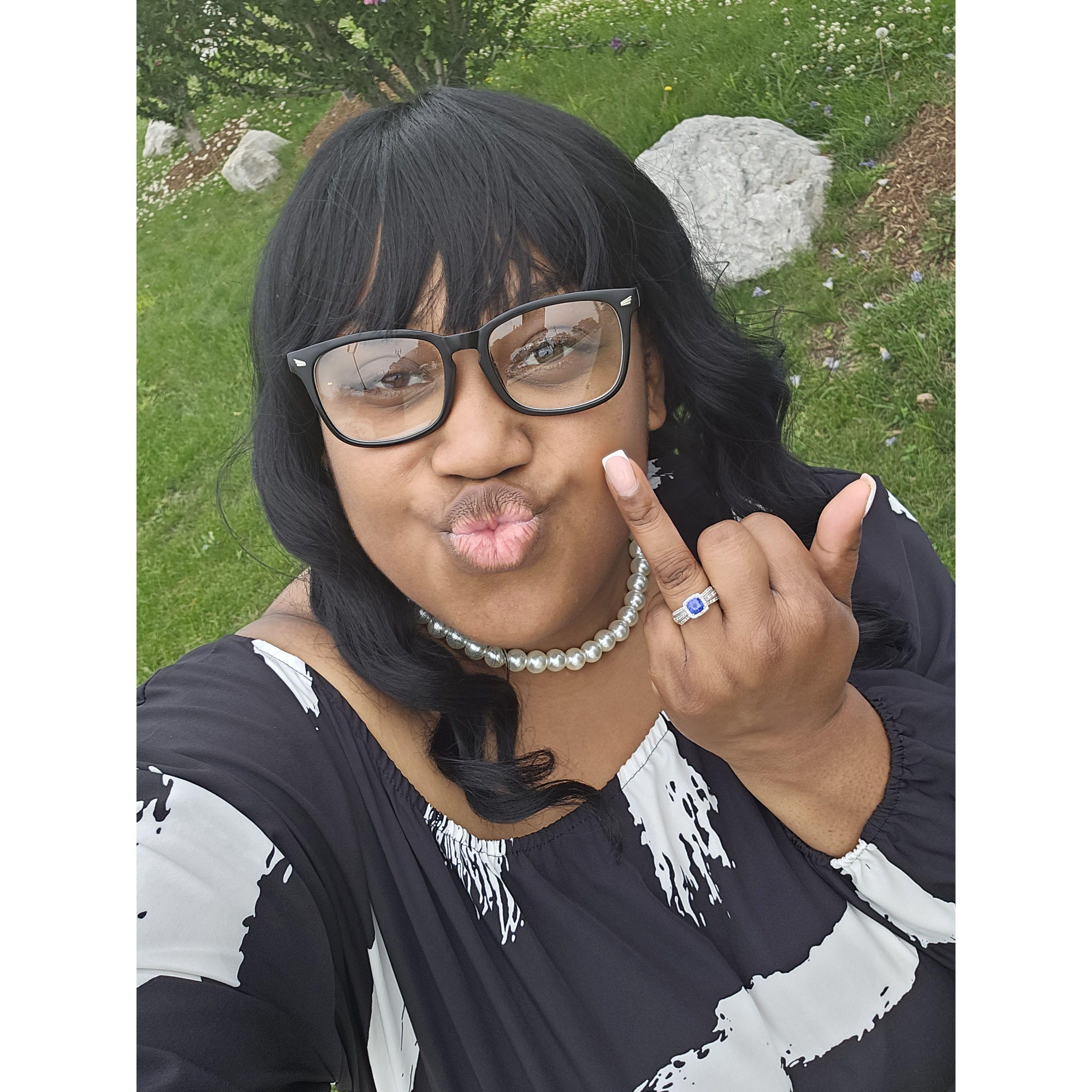 Bria's favorite finger. It isn't an F you, but an "I Do"