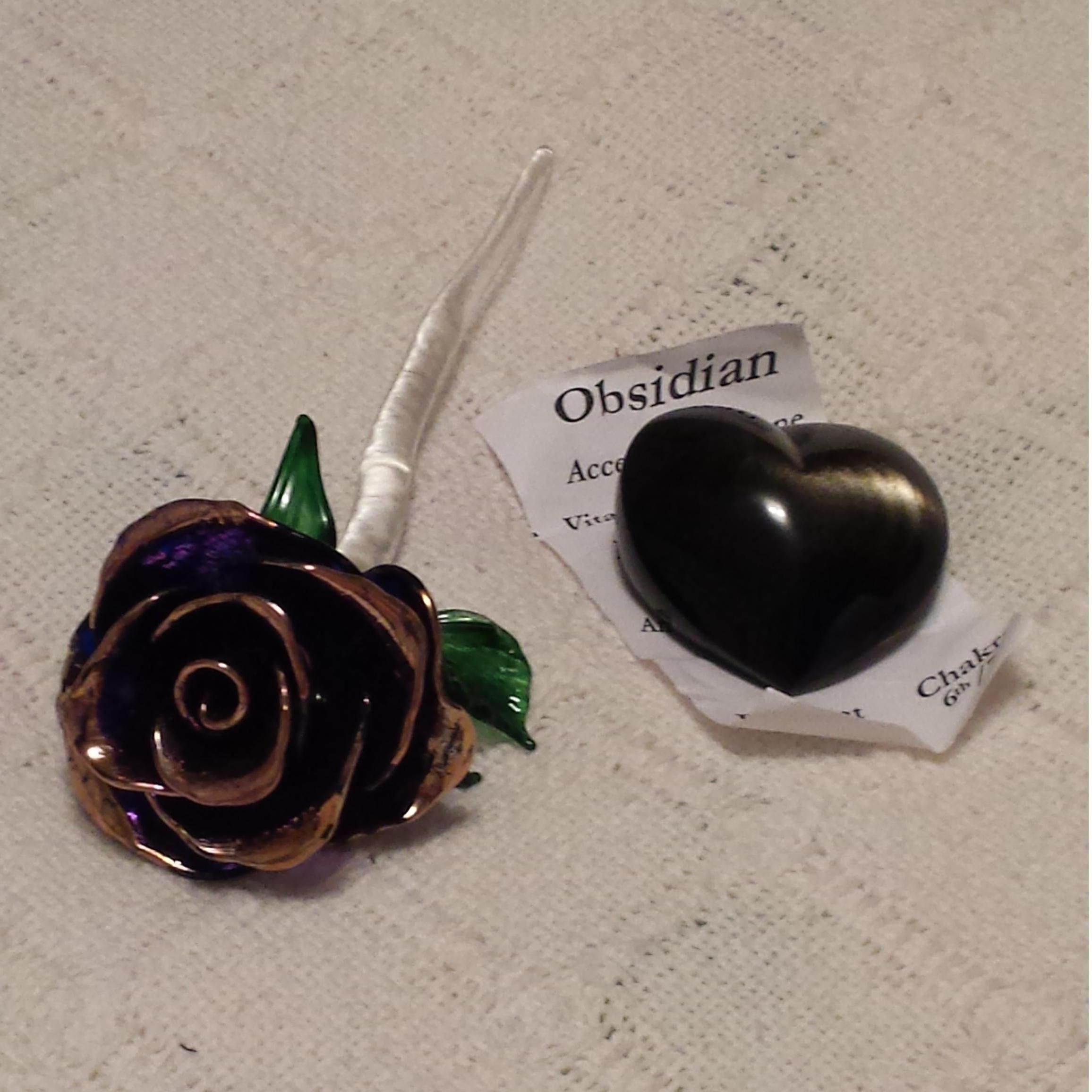 The very first gift he gave me! The heart to hold when we were apart. A gold trimmed glass rose for our love and friendship blossoming.