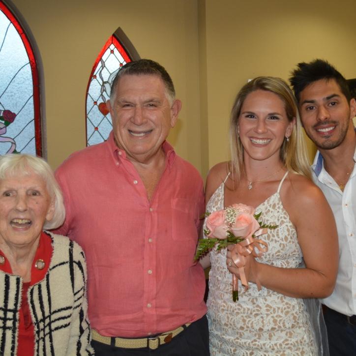 Alexis' father and grandmother.
