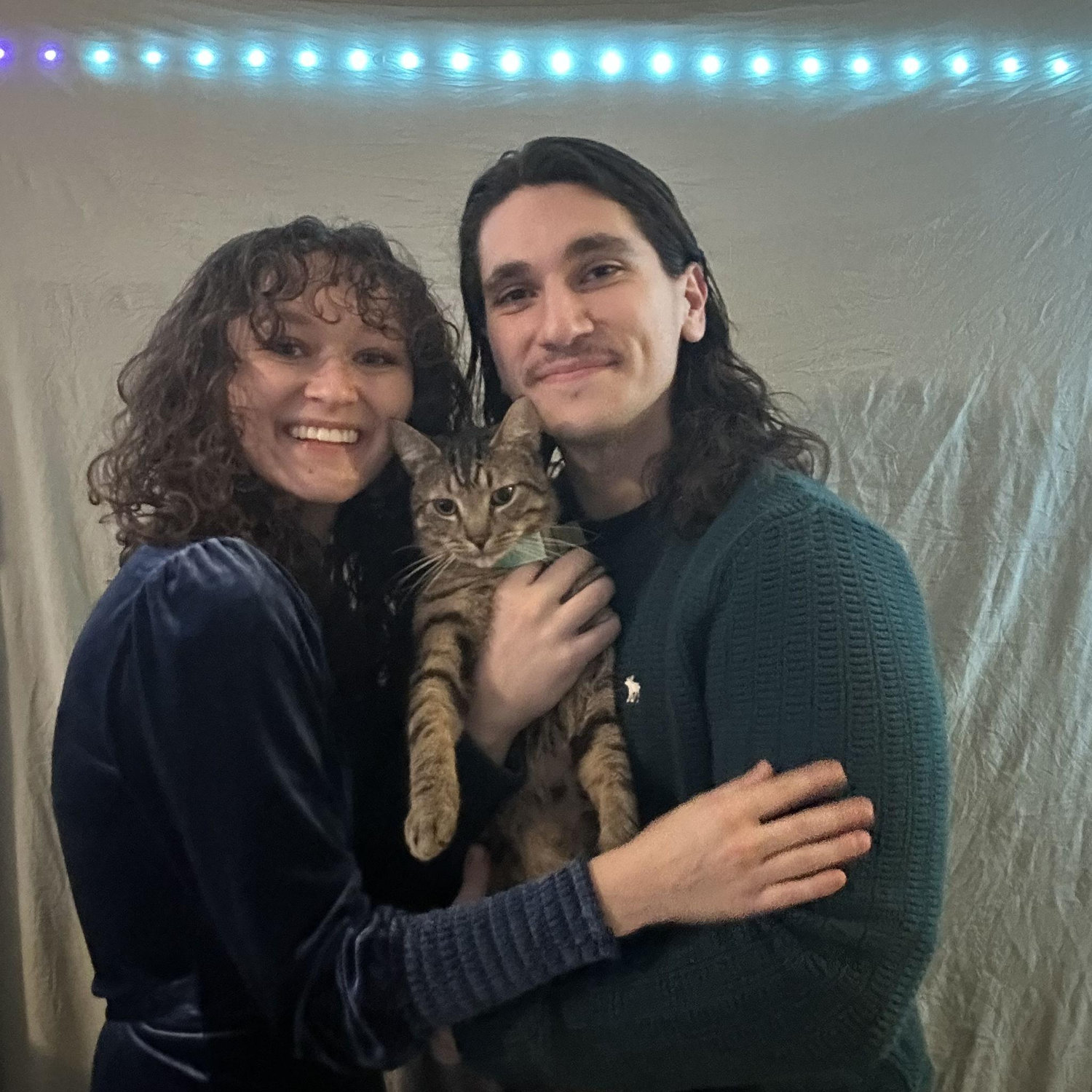 December 2023 - Our first family portrait with Miles Root Beer, adopted in October '23