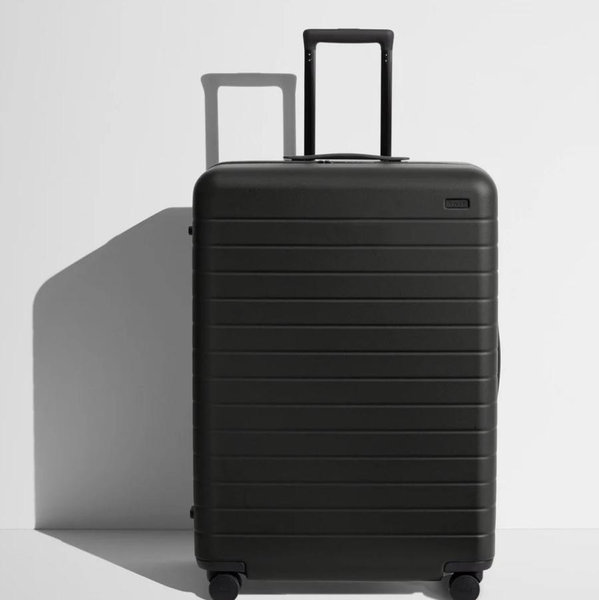 Shop Large & Checked Suitcases in Black| Away