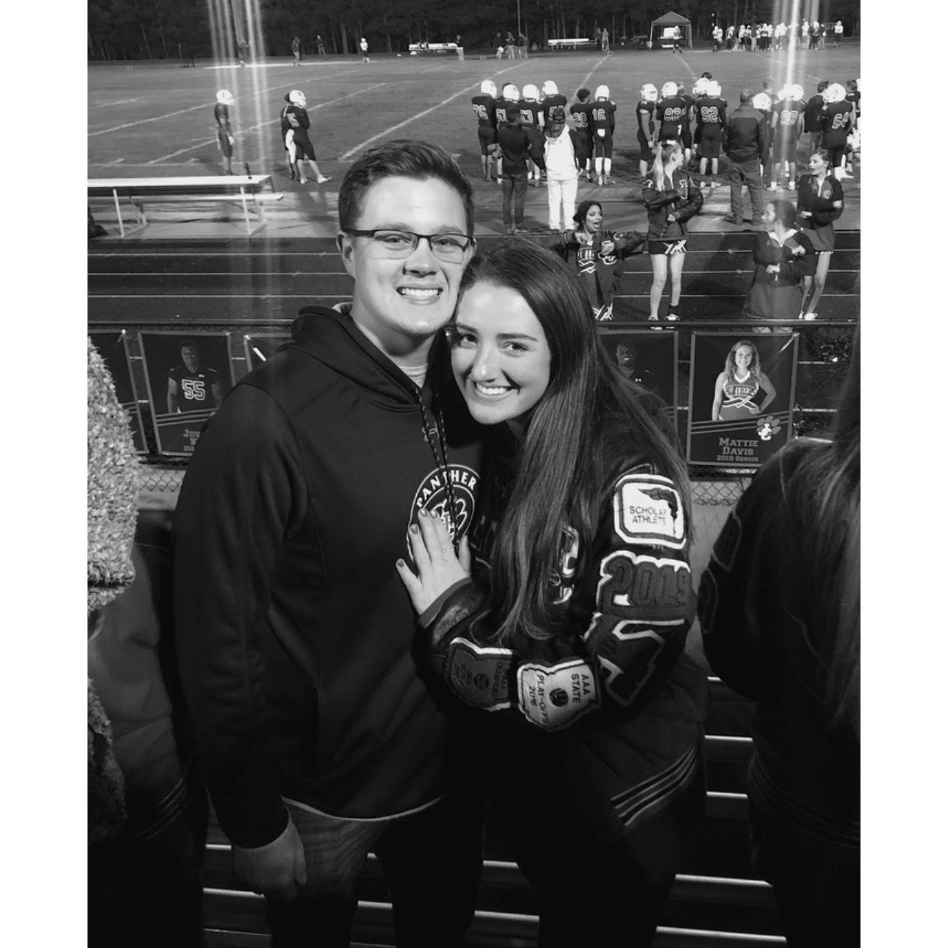 A Friday night football game in high school when we first started dating!