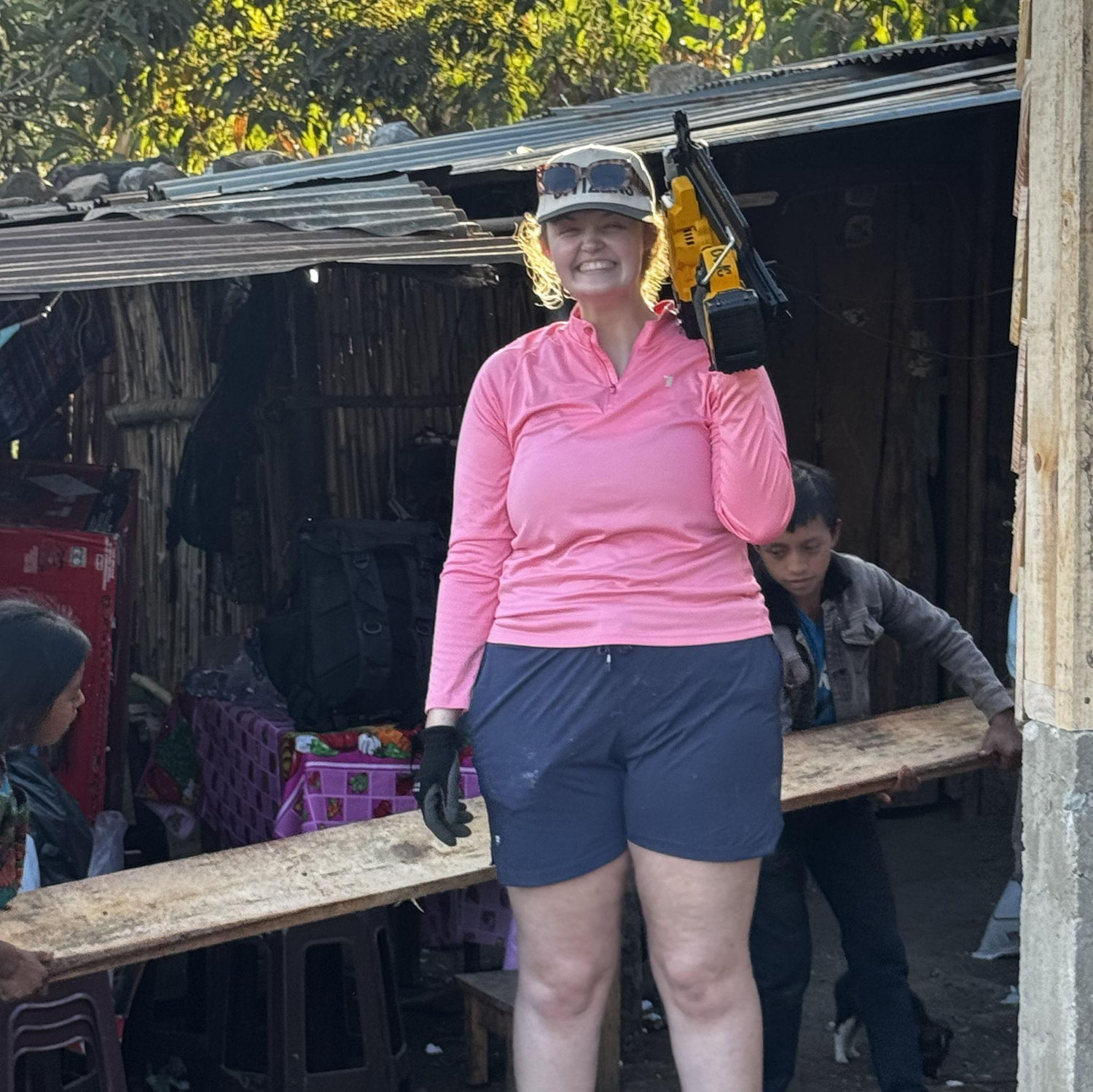 Who wouldn't trust that girl with a nail gun?!