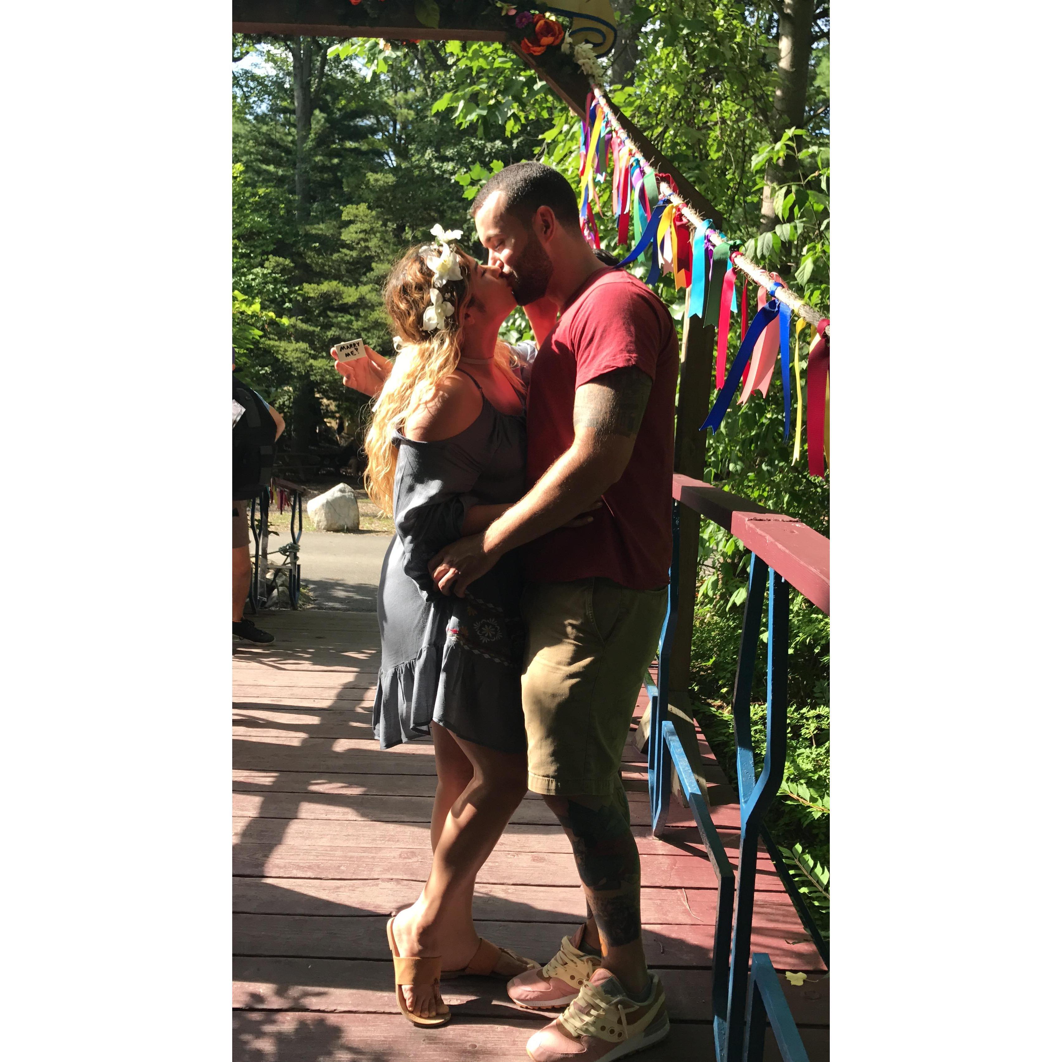 August 10th, 2017 Jeanette wanted a picture with Kevin on the Kissing bridge of the renaissance faire. She felt Kevin's hand behind her head, but thought he was being silly and making bunny ears.