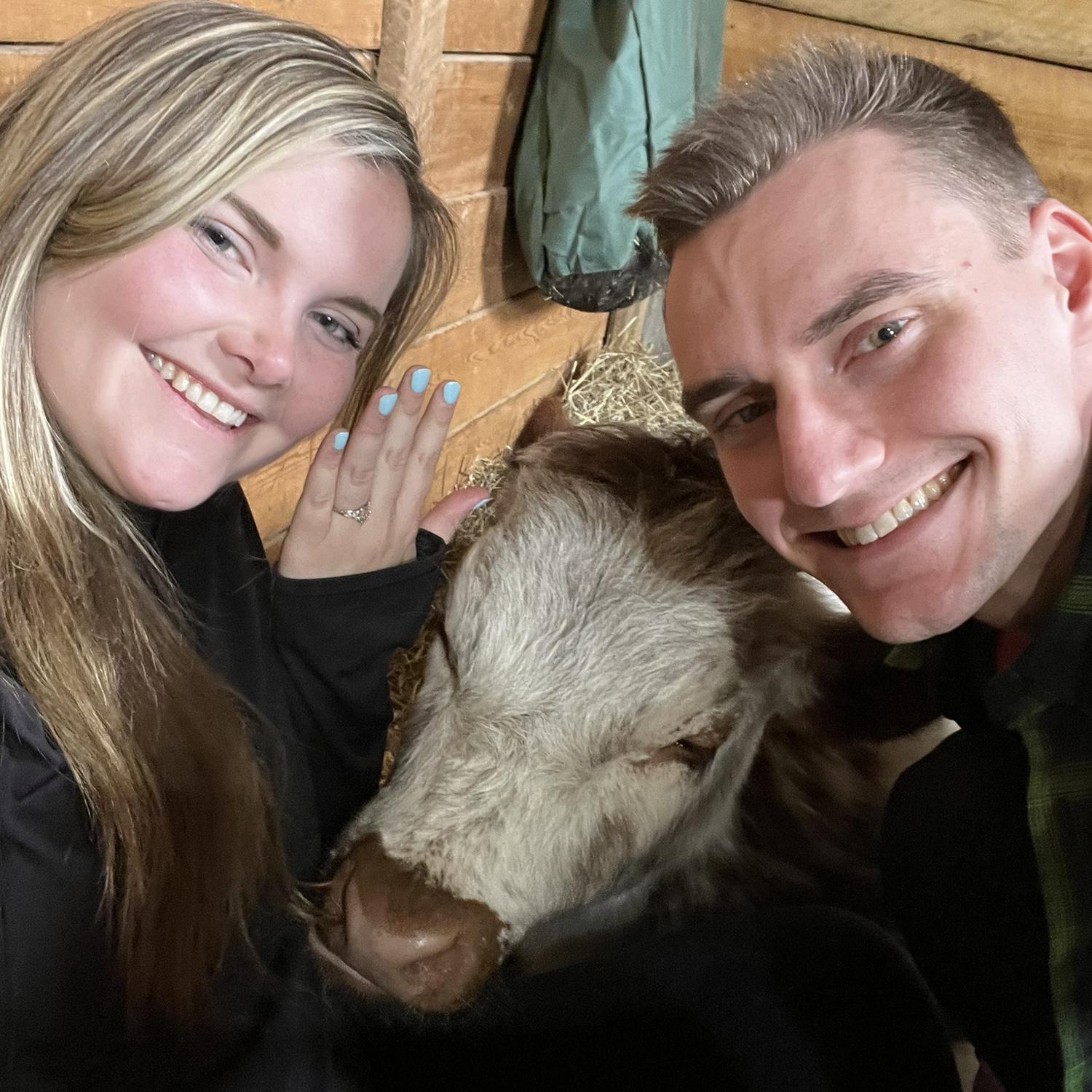 After Adam proposed, they went cow cuddling at a local farm with a calf named Biscuit. It was a Christmas gift from Adam’s parents- they can’t wait to go back to Granite Oak Farm!