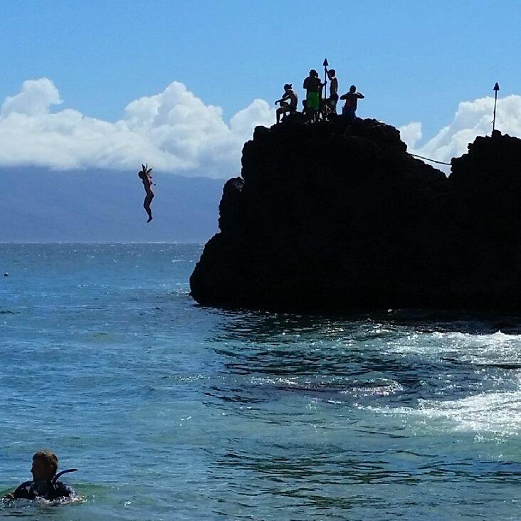 Hucked it! Cliff jumping in Black Rock, Hawaii. Dave and I were suppose to jump together but I made the last jump and he was there to catch me.